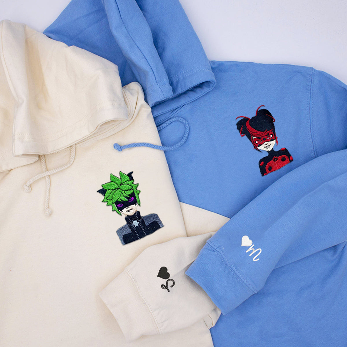 Custom Embroidered Hoodies & Sweatshirts for Couples with Initials, Red & Green Masked Hero Pair Set